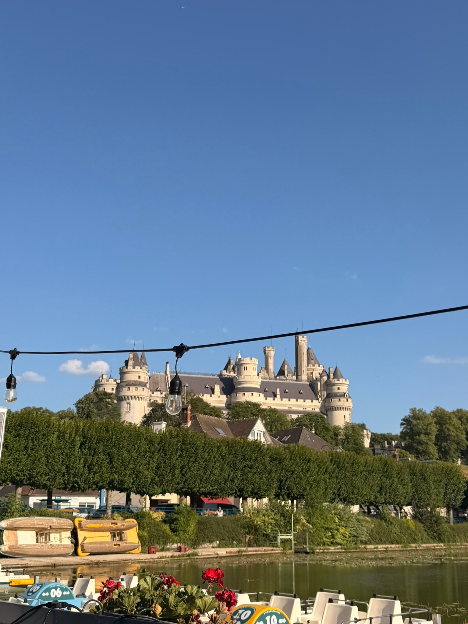 Château de Pierrefonds seen on a hill from a distance